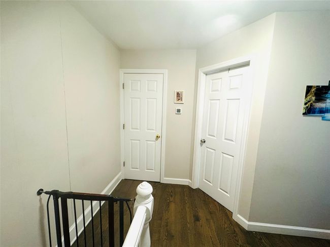 Hall with baseboards and dark wood-style floors | Image 13