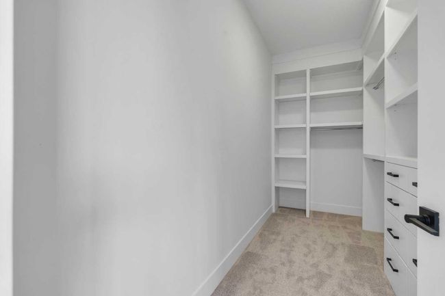 223 Kinniburgh Loop, House other with 4 bedrooms, 4 bathrooms and 5 parking in Chestermere AB | Image 43