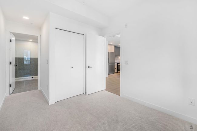 Primary Bedroom featuring a closet, carpet flooring | Image 11