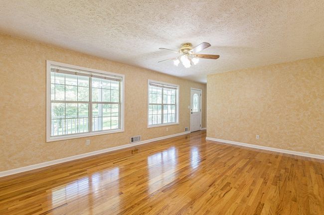 1130 Coan Dr, Home with 3 bedrooms, 2 bathrooms and null parking in Locust Grove GA | Image 4