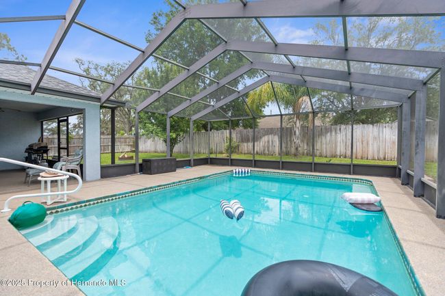 10457 Cranston St, House other with 5 bedrooms, 2 bathrooms and null parking in Spring Hill FL | Image 5
