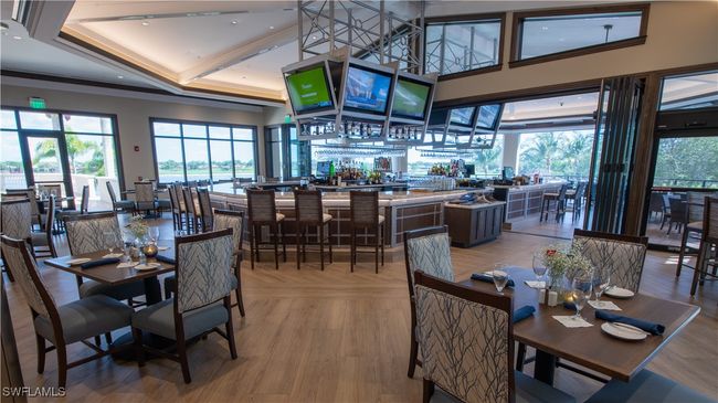 Grill Room featuring indoor and outdoor bar and dining room | Image 23