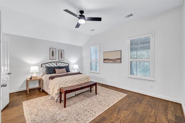 Bedroom with vaulted ceilings | Image 19