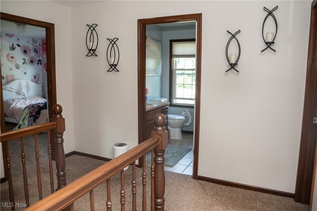 Hallway with carpet flooring | Image 29