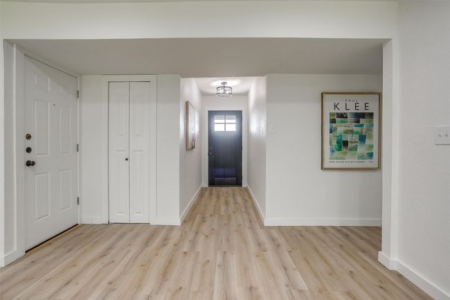 Foyer with light wood-style floors | Image 6