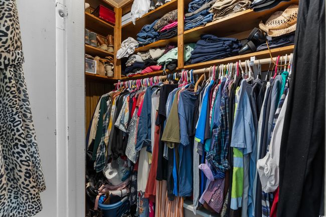 View of walk in closet | Image 25