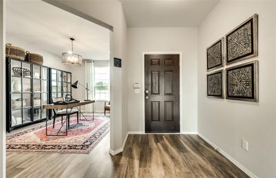 Welcoming entry way *Photos of furnished model. Not actual home. Representative of floor plan. Some options and features may vary | Image 3