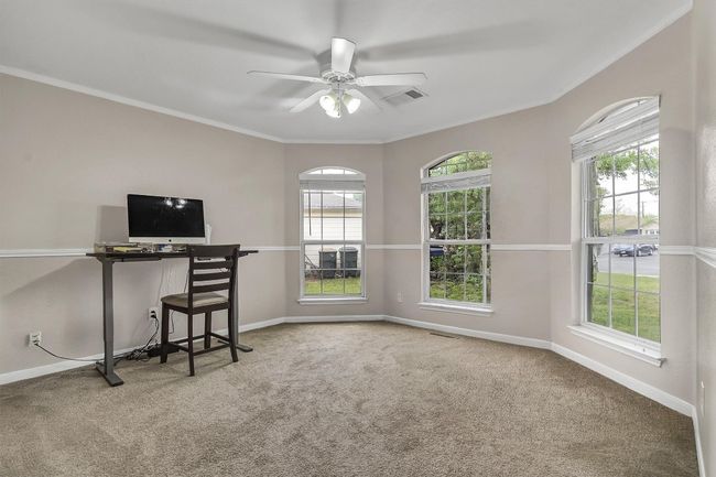 Spacious front bedroom with bay window | Image 12