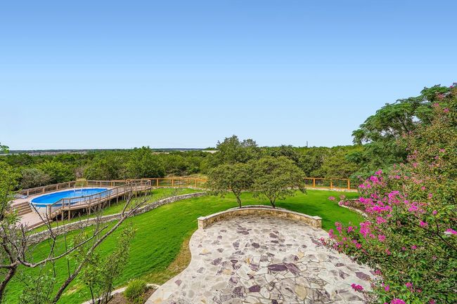 View of yard with outdoor pool and a patio | Image 28