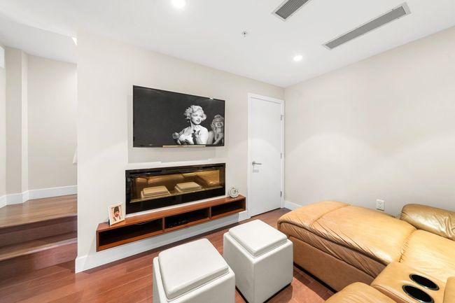 Living area featuring wood finished floors and recessed lighting | Image 22