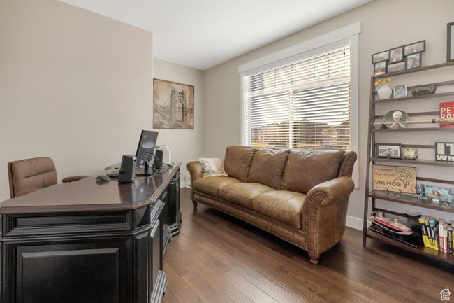 Office featuring baseboards and wood finished floors | Image 15