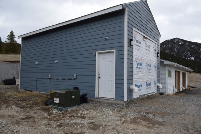 Rear view of property with an outdoor structure | Image 93