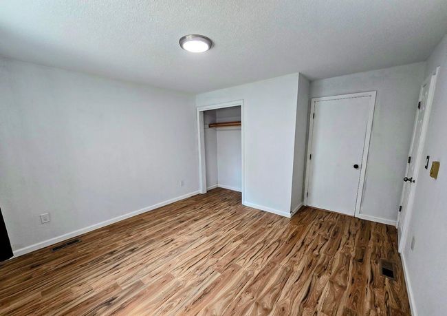 Bedroom #2 has door to bathroom, closet, and living room | Image 17