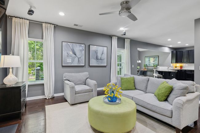 I told you there is more green from the windows. Check out nature peeking inside. The living room is open to the kitchen dining making this a great space for entertaining or just enjoying a relaxing dinner time at home with family | Image 6