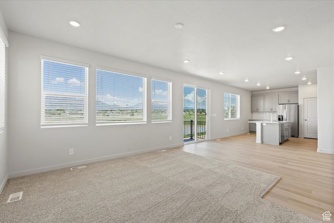 Unfurnished living room featuring recessed lighting and light wood finished floors | Image 14