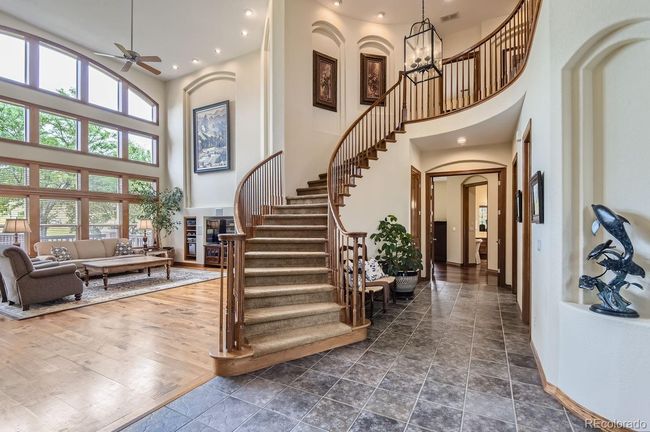 Greeted by the grand foyer with 20' ceilings! | Image 8