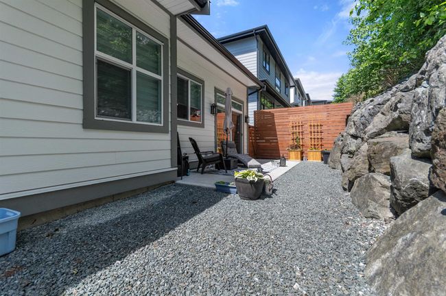 View of side of home featuring a patio area | Image 38