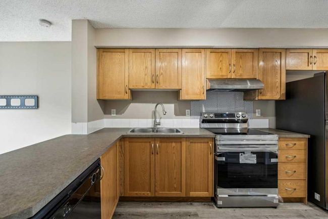 288 Saddlebrook Point Ne, Home with 2 bedrooms, 1 bathrooms and 2 parking in Calgary AB | Image 4