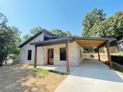 View of front of home featuring a carport | Image 1