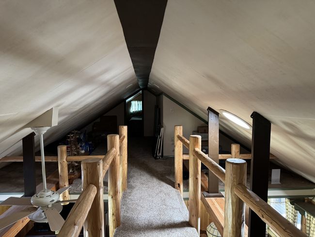 Unfinished attic with an upstairs landing and healthy amount of natural​​‌​​​​‌​​‌‌​‌‌​​​‌‌​​‌‌​‌​​​​​‌ light | Image 16