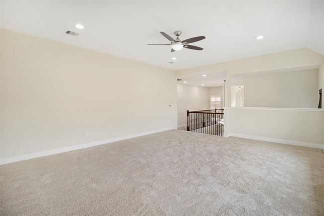 Game Room facing the walkway and bridge to the other secondary bedrooms. | Image 24