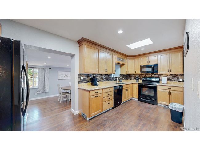 8438 Ames St, House other with 5 bedrooms, 3 bathrooms and null parking in Arvada CO | Image 9