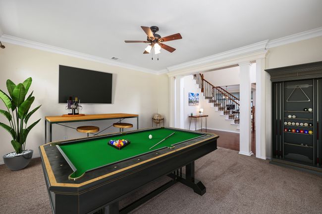 View from living-game room looking into the foyer. | Image 6