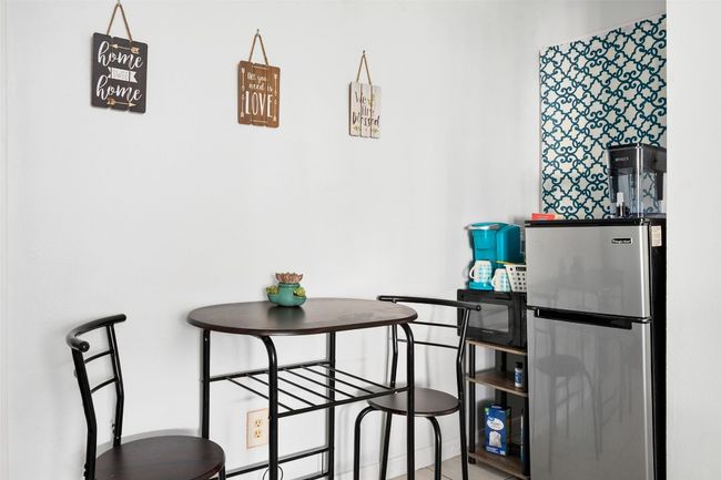 Dining area with baseboard heating | Image 8