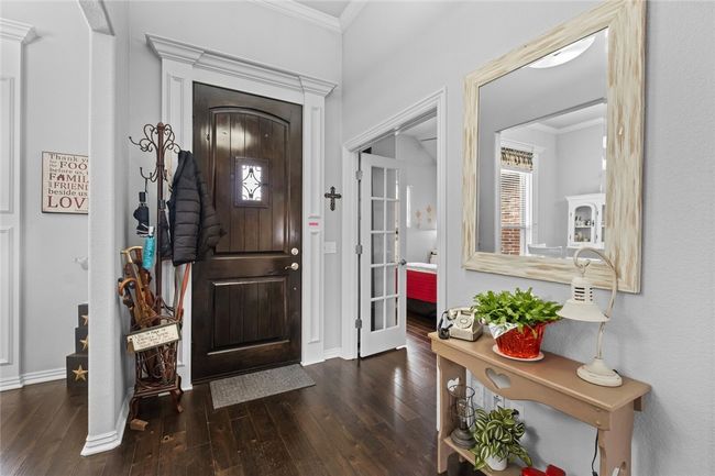 Entrance. Bedroom 2 to your right. Formal dining to your left. | Image 8