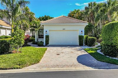 8599 Pepper Tree Way, House other with 3 bedrooms, 2 bathrooms and null parking in Naples FL | Image 1