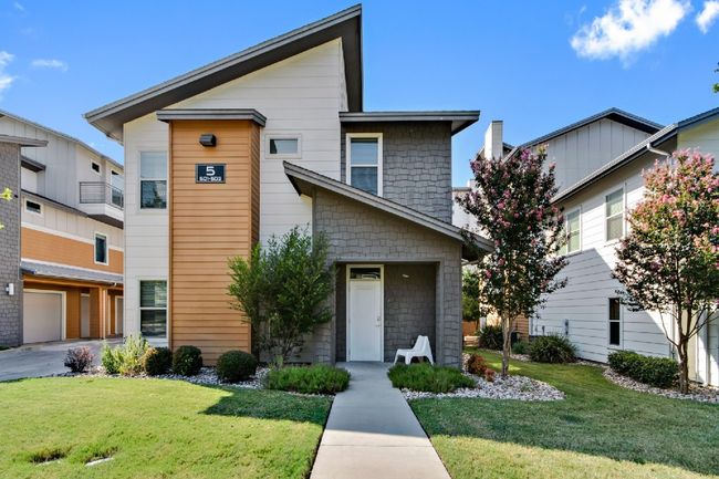 Modern home featuring a front lawn | Image 11