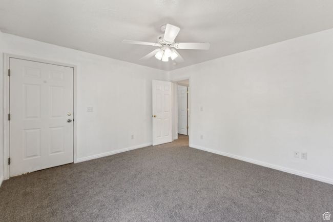 Unfurnished room featuring carpet flooring and a ceiling fan | Image 16