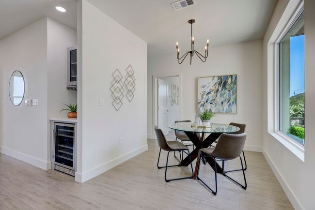 VIEW INTO DINING AREA AND TWO GUEST BEDROOMS ON THIS SIDE OF THE CONDO. | Image 20