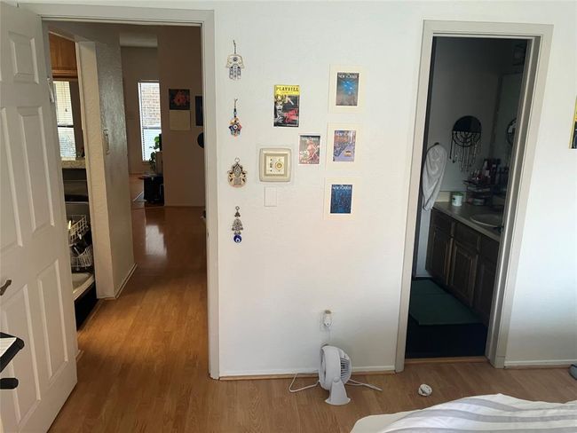 Hallway featuring light wood-type flooring and baseboards | Image 18