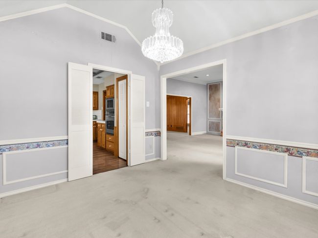 Alternate view of dining room with access to living room and kitchen. | Image 15