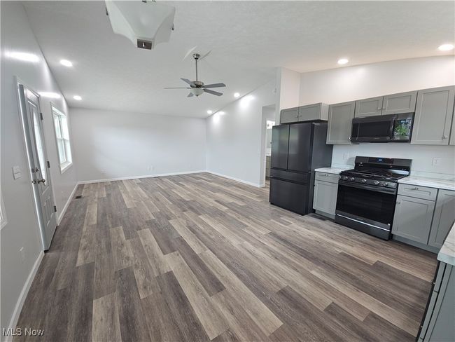 View from where table and chairs might go and still room for island | Image 11