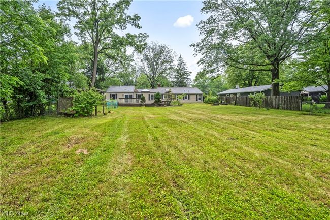 View of yard with a deck | Image 40