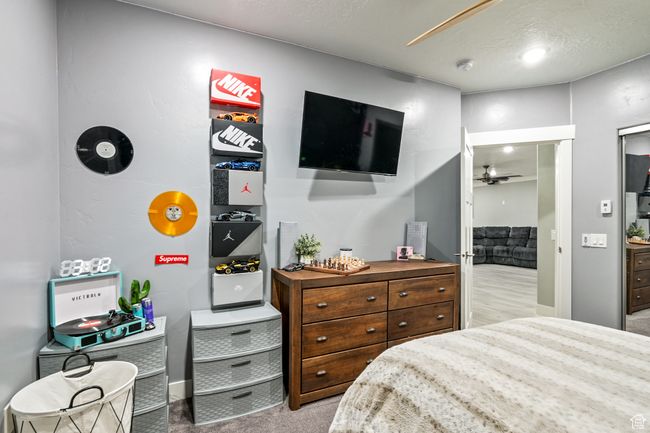 View of carpeted bedroom | Image 79