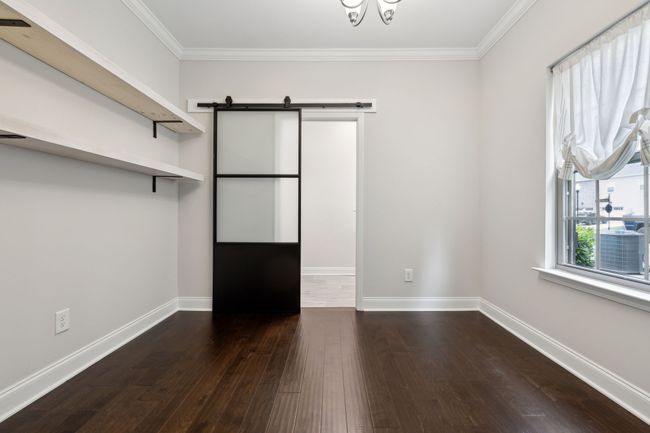 Floating shelves to remain. Designer sliding door leads to laundry room | Image 14