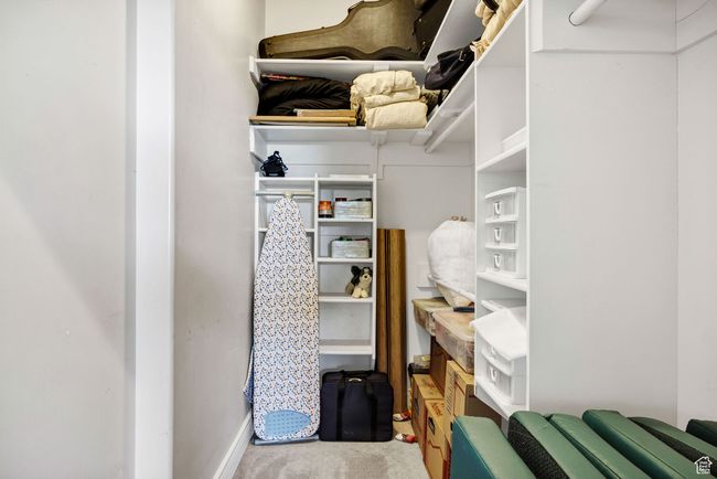 Spacious closet featuring carpet floors | Image 54