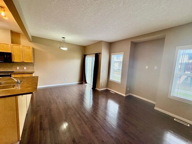 703 - 620 Luxstone Landing Sw, Townhouse with 3 bedrooms, 3 bathrooms and 2 parking in Airdrie AB | Image 7