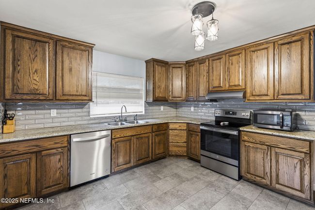123 North Blvd E, House other with 3 bedrooms, 3 bathrooms and null parking in MACCLENNY FL | Image 11