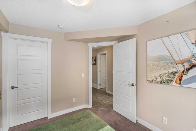 907 Cranbrook Walk Se, Home with 2 bedrooms, 1 bathrooms and 2 parking in Calgary AB | Image 13