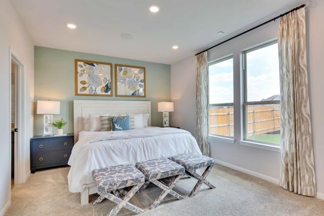 Bedroom with light colored carpet and recessed lighting | Image 8