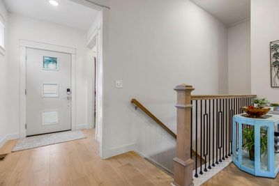 Entryway with light wood-type flooring | Image 3