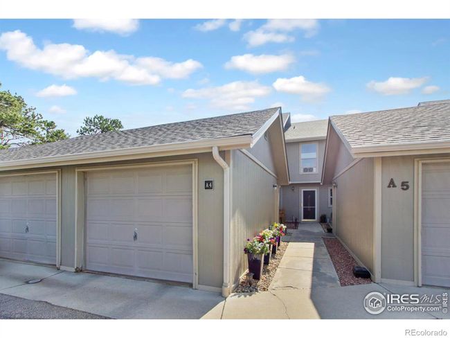 The single car garage has a convenient access door that is just steps away from the front entrance to the home. | Image 22