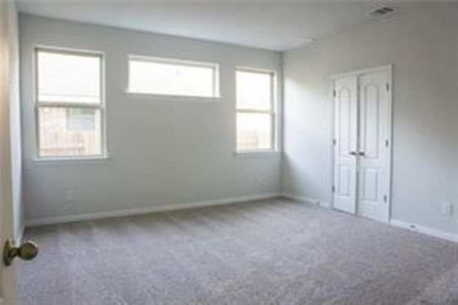 Carpeted spare room with baseboards | Image 19