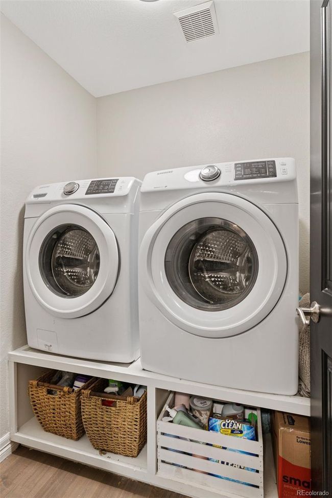 laundry room with pedistals and storage. washer/dryer included | Image 24