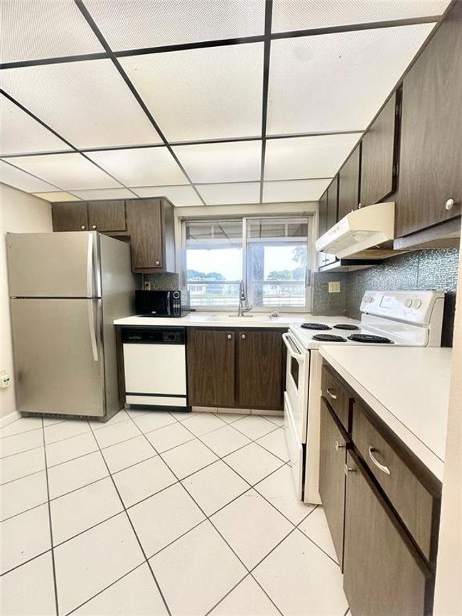 APT-108 - 9330 Lime Bay Blvd, Condo with 2 bedrooms, 2 bathrooms and null parking in Tamarac FL | Image 7
