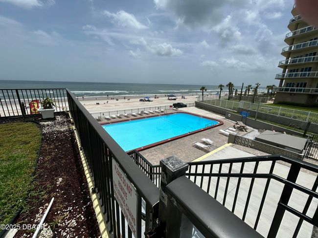 213-1909 S Atlantic courtyard stairway to pool | Image 10